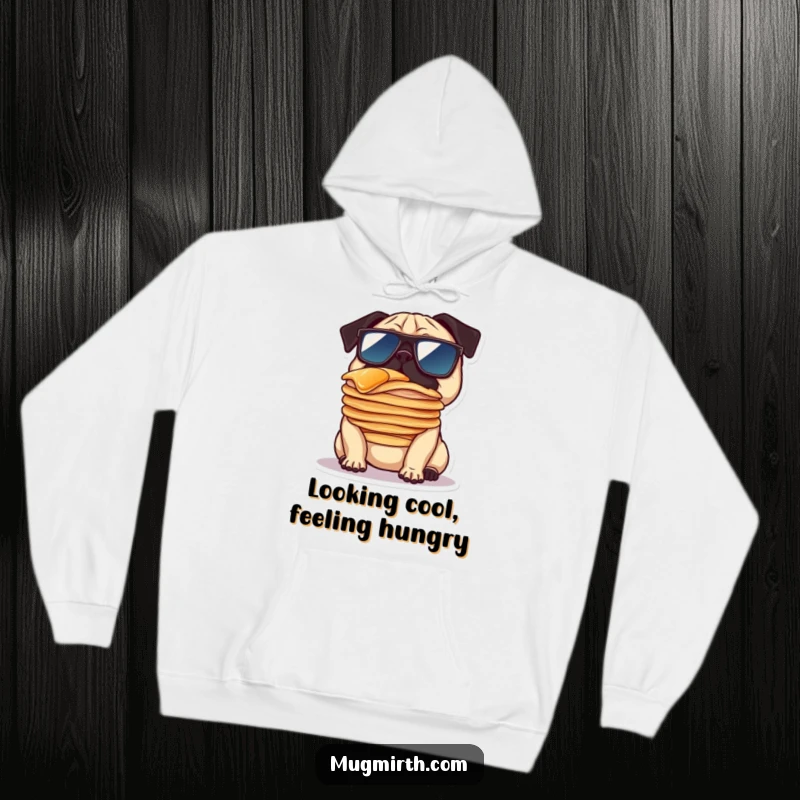 Funny hoodie design of a pug in oversized sunglasses balancing pancakes on its nose, offering cozy comfort with a humorous twist.