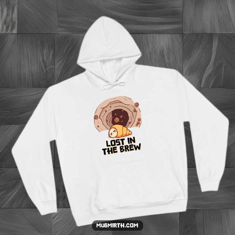 Funny hoodie design with a sleepy croissant comically entering a wormhole, led by a coffee bean, ideal for cozy, humorous wear.