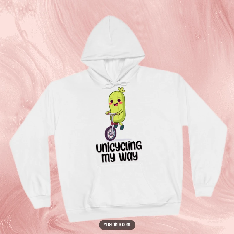 Funny Hoodie: A cozy sweatshirt featuring a smiling pickle attempting to ride a unicycle with wobbles.