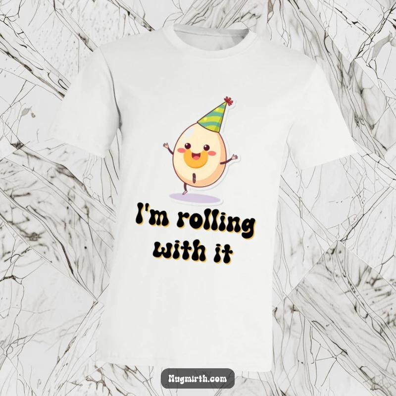 Funny t-shirt featuring a smiling egg in a party hat attempting a cartwheel with energetic abandon, a humorous gift.